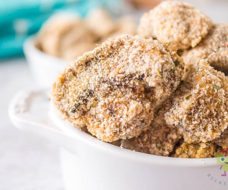 breaded mushrooms in a white bowl