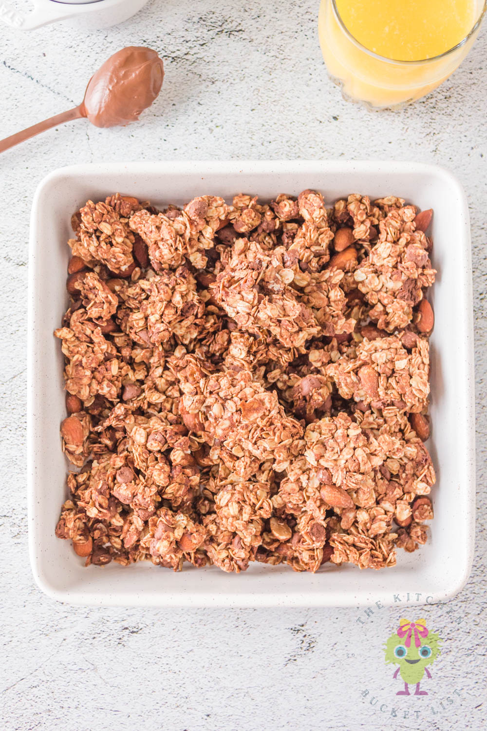 Air fried Nutella granola broken into large clusters ready to serve for breakfast.