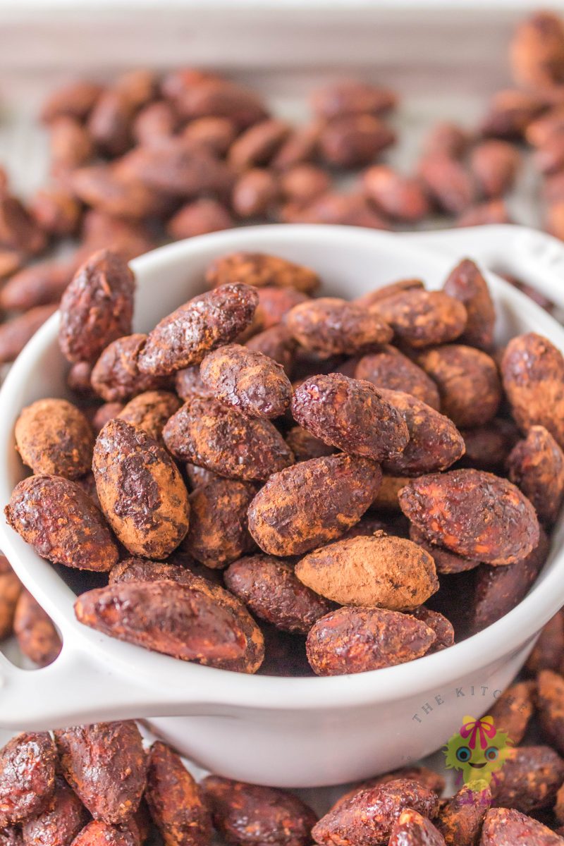 white bowl filled with roasted almonds