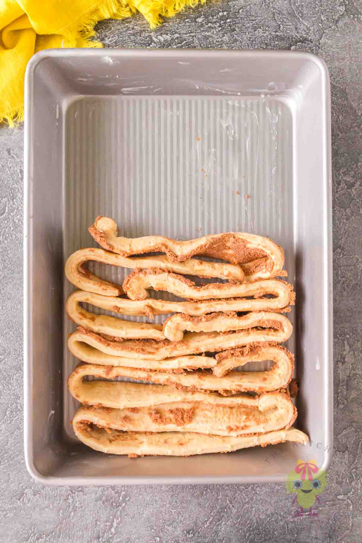 Unravel the Pillsbury dough into "S" folds.