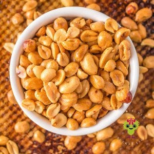 Roasted air fryer peanuts seasoned with salt ready to eat out of a bowl.