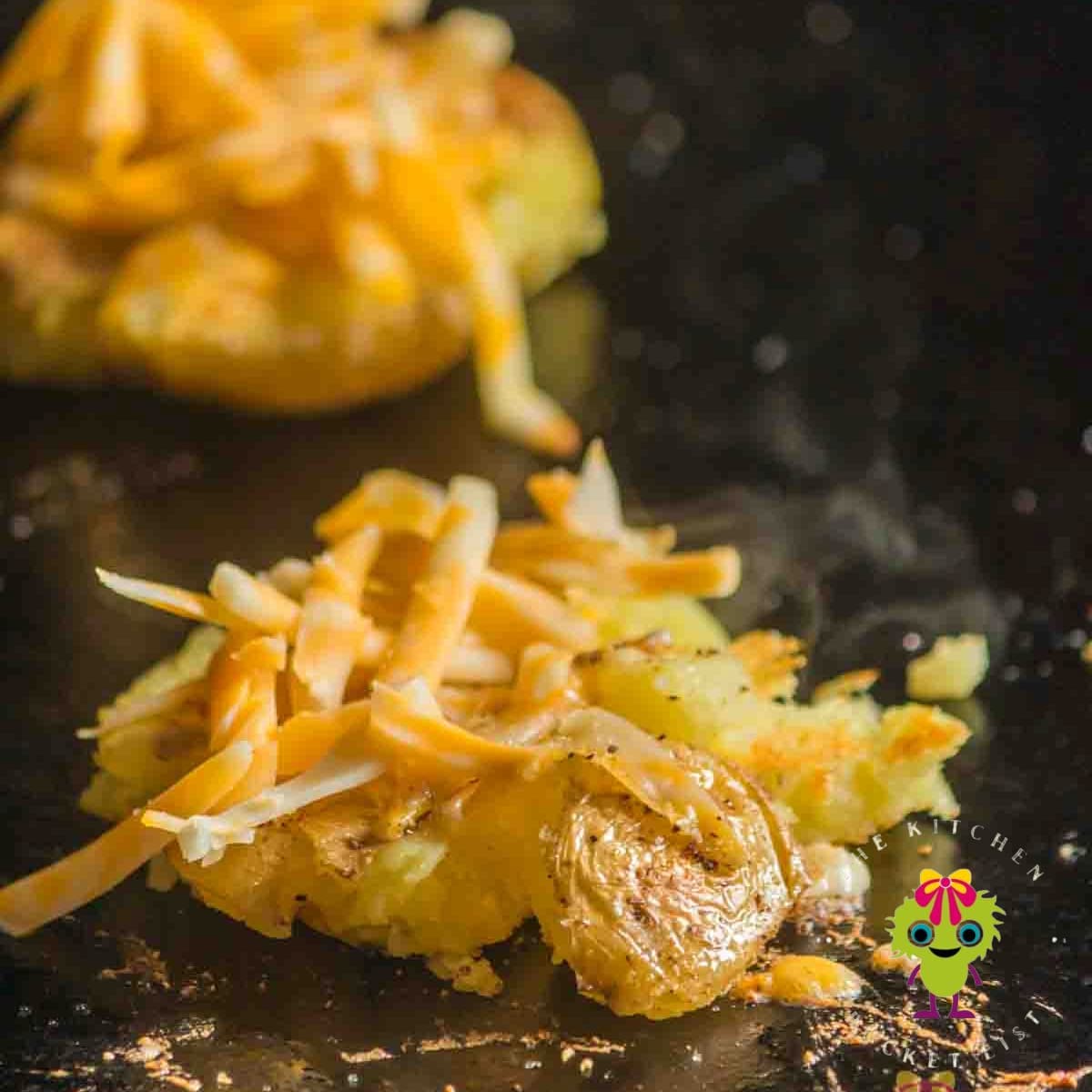 Smashed potatoes with cheese - The Kitchen Bucket List