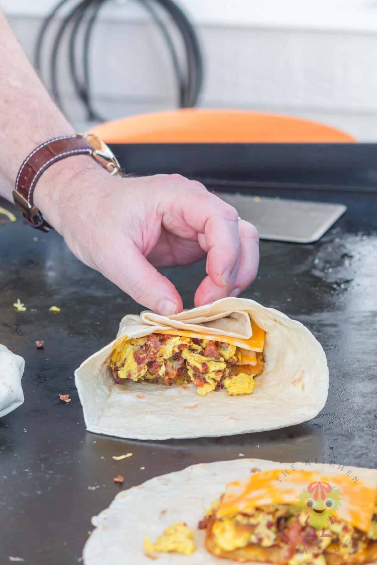 Folding the Taco Bell breakfast crunchwraps starts at the side nearest to you, and then you work around.