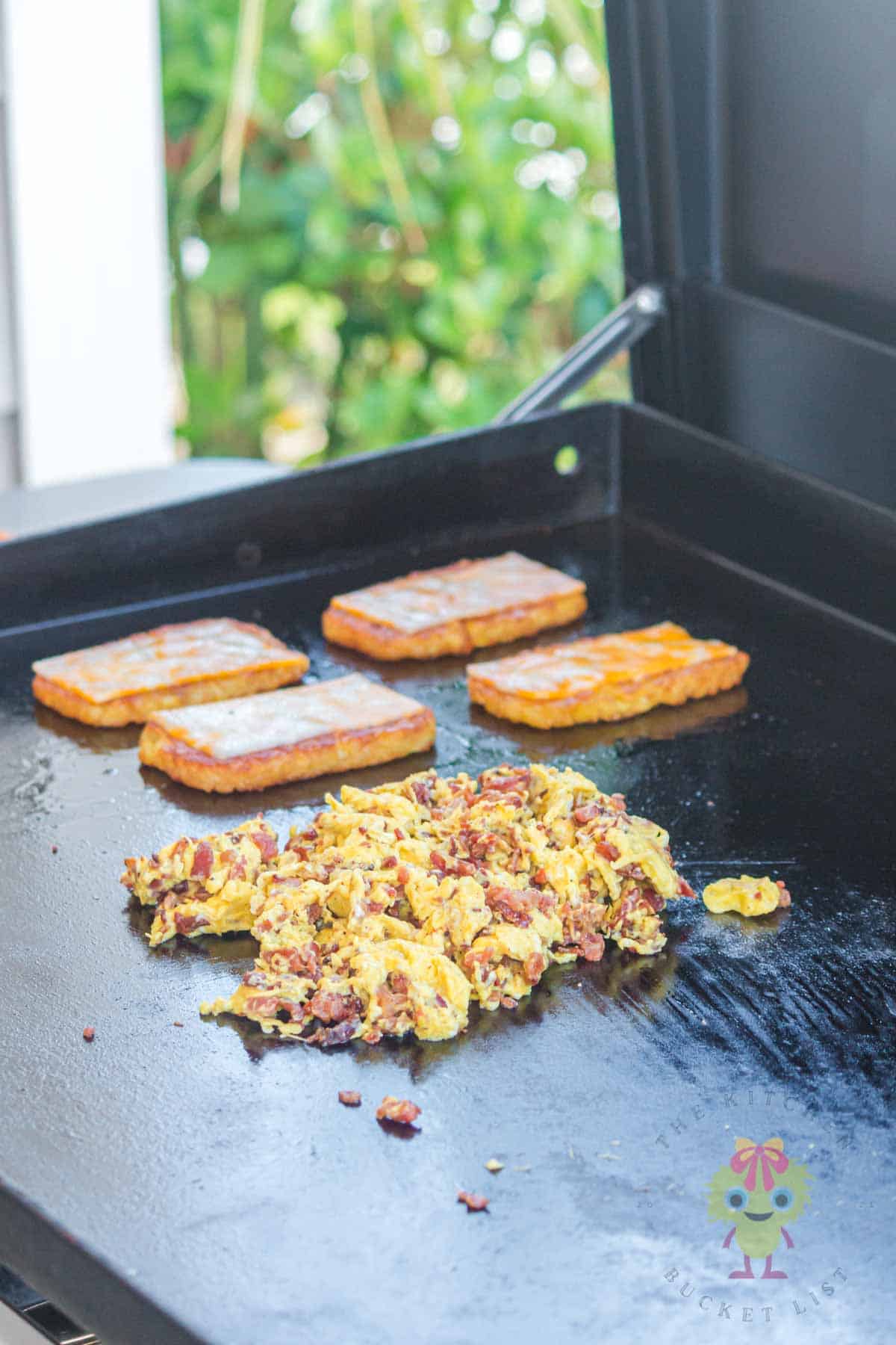 Hashbrowns are golden crisp with cheese melting, and the fluffy scrambled with bacon are grilled perfectly.