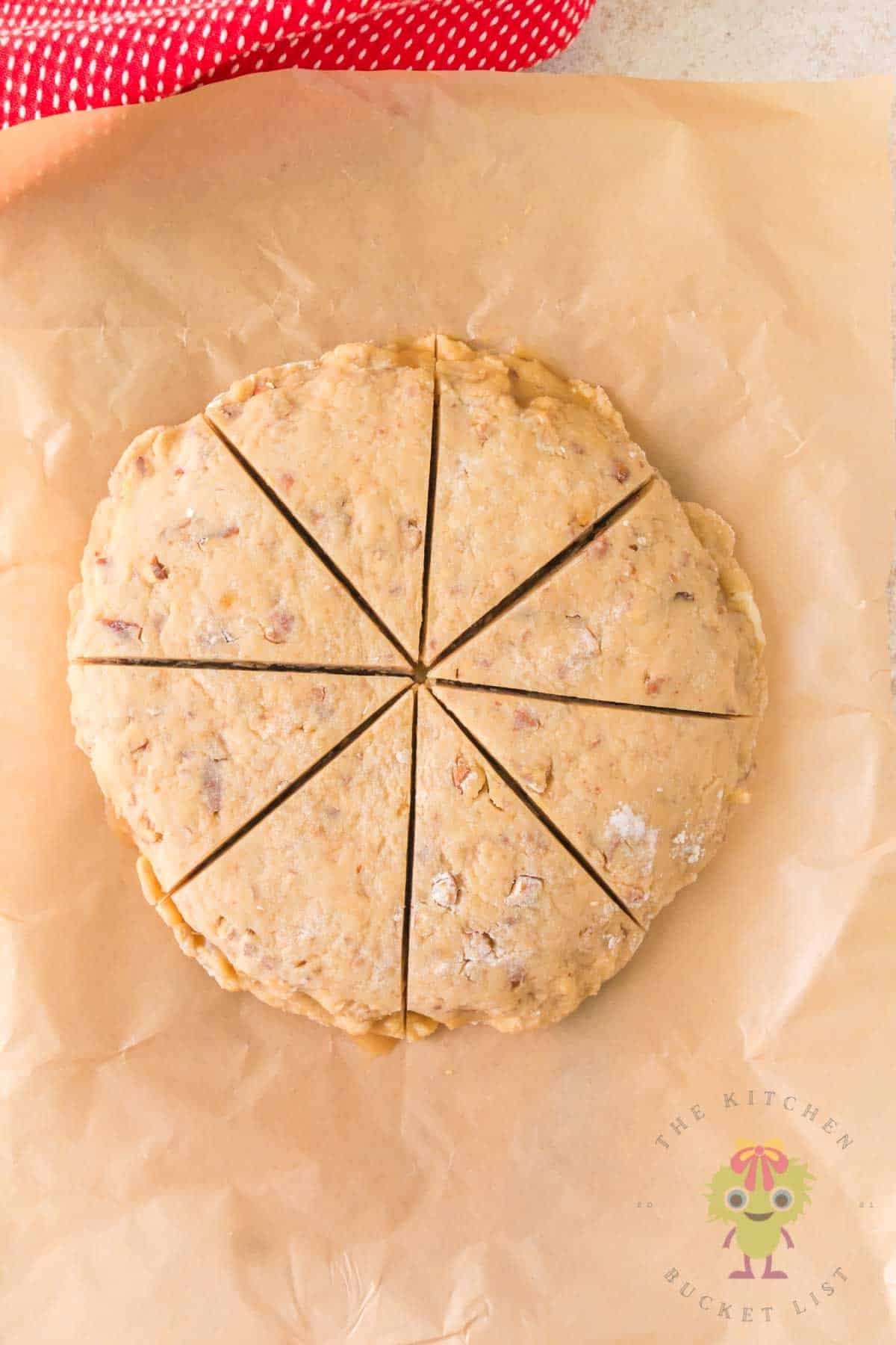 An overhead picture shows how to make 8 pecan pie scones, then bake and enjoy!